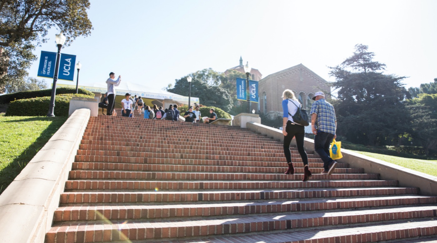 View of Janss Steps as a group of students sit on the steps.