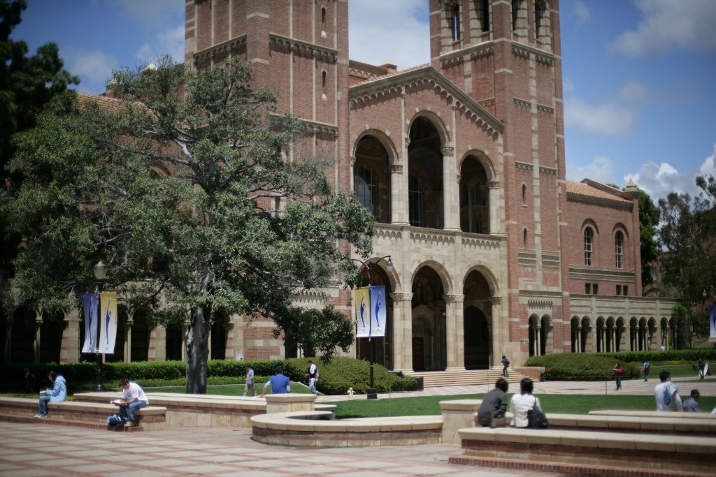 A view of Royce Hall from the Shapiro Fountain area at the top of Janss Steps. Commencement banners are visible